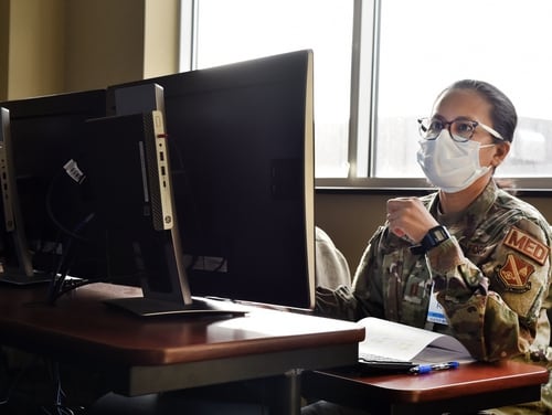 Capt. Eliza Pacis, an Air Force nurse assigned to the 62nd Medical Brigade, trains on new electronic medical records software at Joint Base Lewis-McCord, Wash., on Nov. 24, 2020. (Master Sgt. Helen Miller/Air Force)