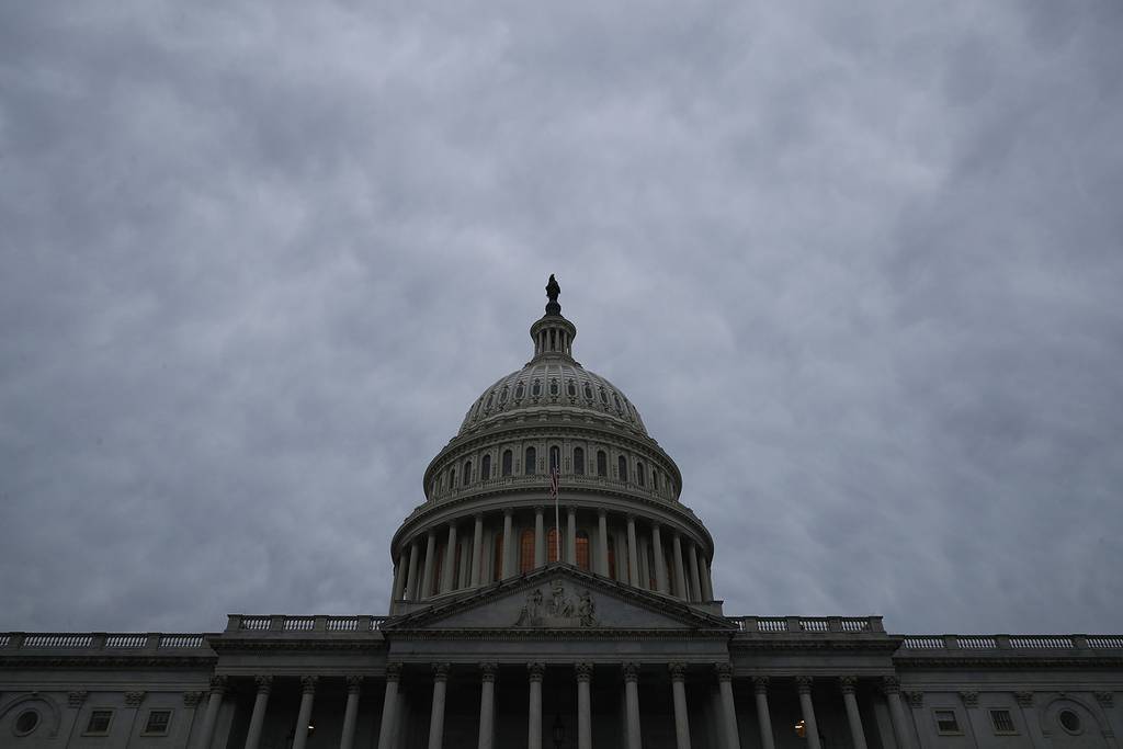The U.S. Capitol dome stands under a cloudy sky Jan. 03, 2019, in Washington.