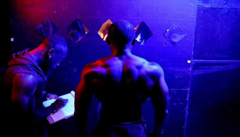 Wes Phills weighs in on Oct. 6 prior to the International Association of Trans Bodybuilders competition in Atlanta, Georgia. Phills, an active-duty sailor, won the competition. (David Goldman/AP)