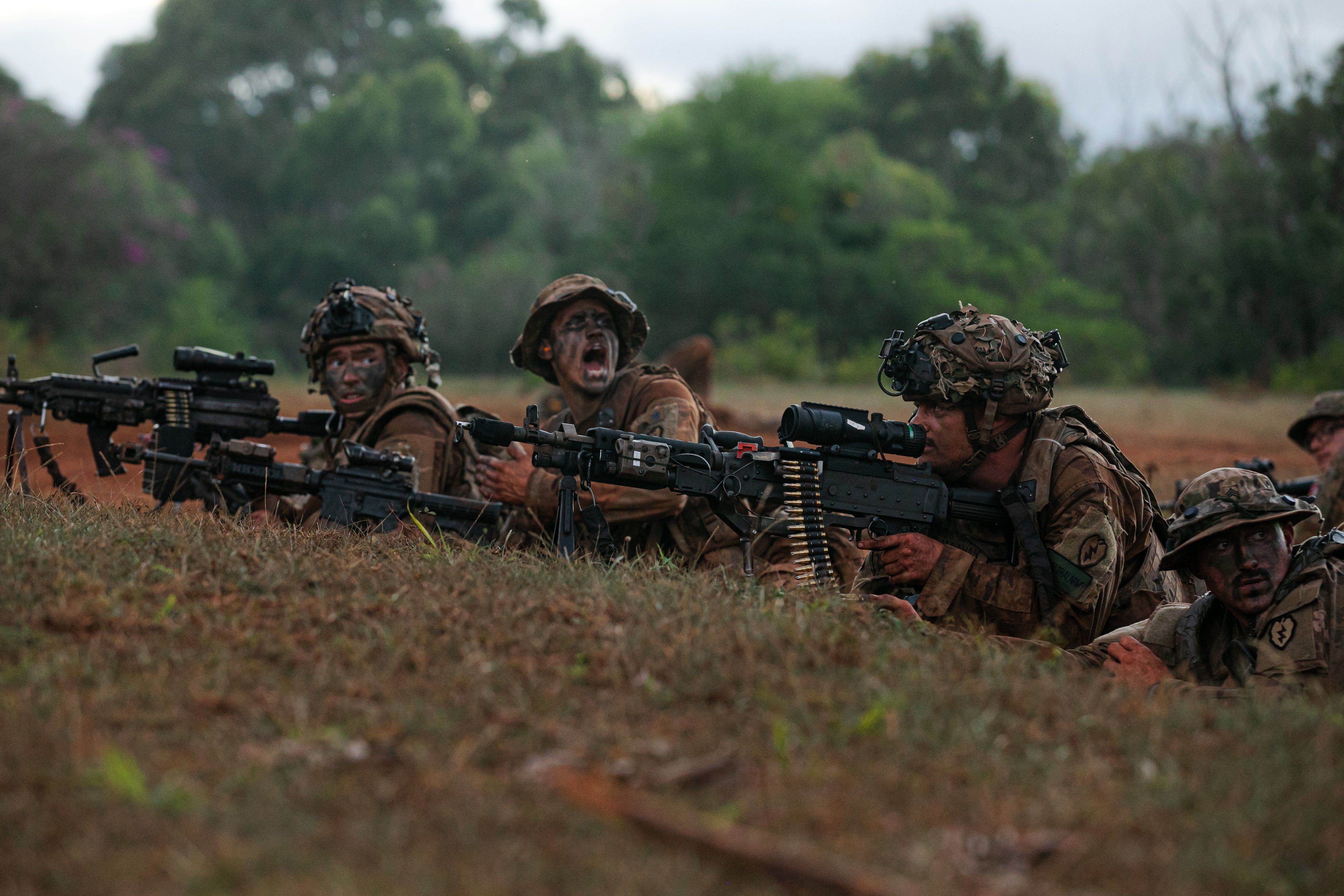 U.S. soldiers defend their area after being ambushed during a Joint Multinational Pacific Readiness Center rotation on Helemano Military Reservation, Hawaii, Oct. 27, 2021. (Spc. Rachel Christensen/Army)