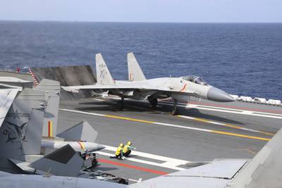 In this photo released by Xinhua News Agency, a J-15 Chinese fighter jet prepares to take off from the Shandong aircraft carrier during the combat readiness patrol and military exercises around the Taiwan Island by the Eastern Theater Command of the Chinese People's Liberation Army (PLA) on Sunday, April 9, 2023.