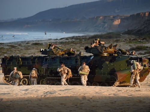 U.S. Marines take positions during an amphibious landing operation with the Japan Maritime Self-Defense Force at the Dawn Blitz 2015 exercise at Camp Pendleton, California, in September 2015. (Mark Ralston/AFP/Getty Images)
