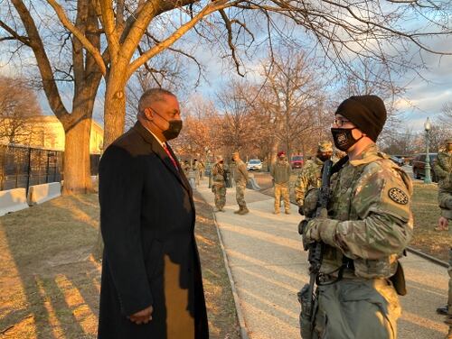 Defense Secretary Lloyd Austin talks to an Army National Guard soldier protecting the U.S. Capitol on Jan. 29, 2021 in Washington, D.C. (Meghann Myers/staff)
