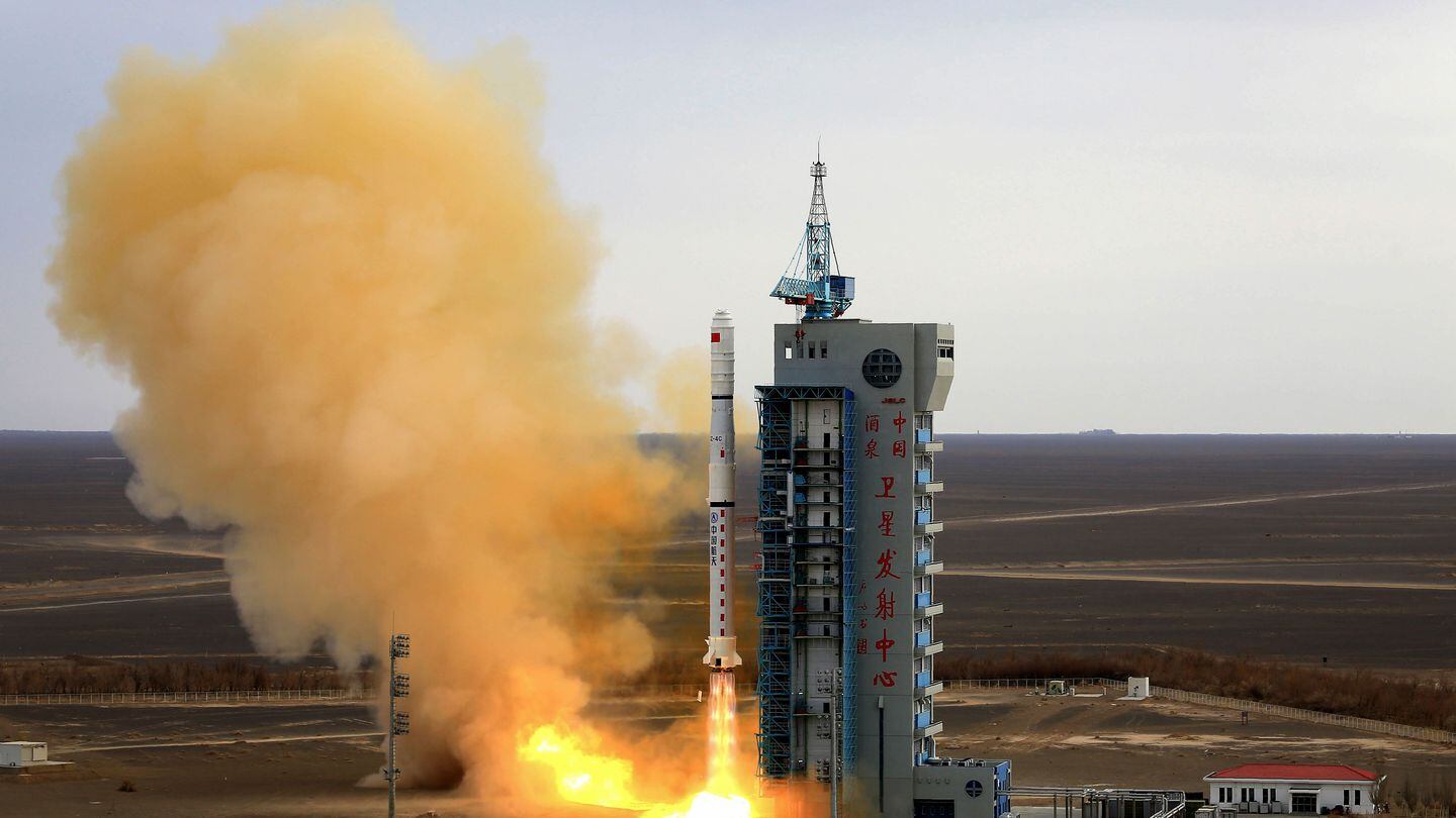 A Long March-4C rocket carrying the third group of China's Yaogan-31 remote sensing satellites lifts off from the country's Jiuquan Satellite Launch Center on Feb. 24, 2021. (STR/AFP via Getty Images)