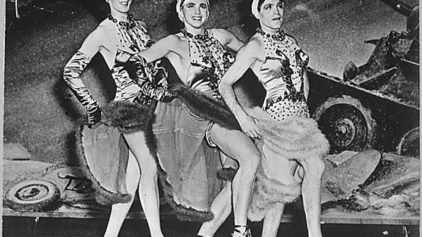 During World War II, soldiers dressed in drag for morale-boosting performances. (National Archives)