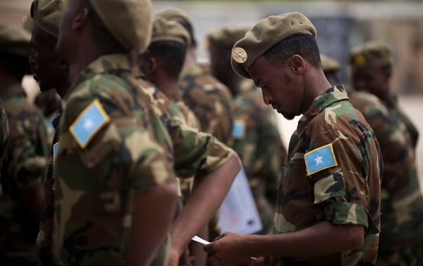A Somali national army soldier stands in formation Aug. 17, 2018, after receiving his certificate of completion at a logistics course graduation ceremony in Mogadishu. (MC2 (SW/AW) Evan Parker/DoD)