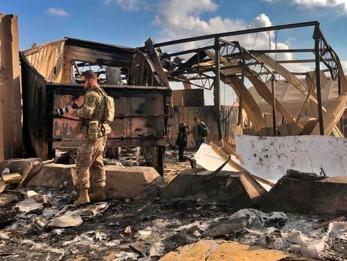 U.S. soldiers and journalists inspect the rubble at a site of Iranian bombing, in Ain al-Asad air base, Anbar, Iraq, Monday, Jan. 13, 2020. (Qassim Abdul-Zahra/AP)