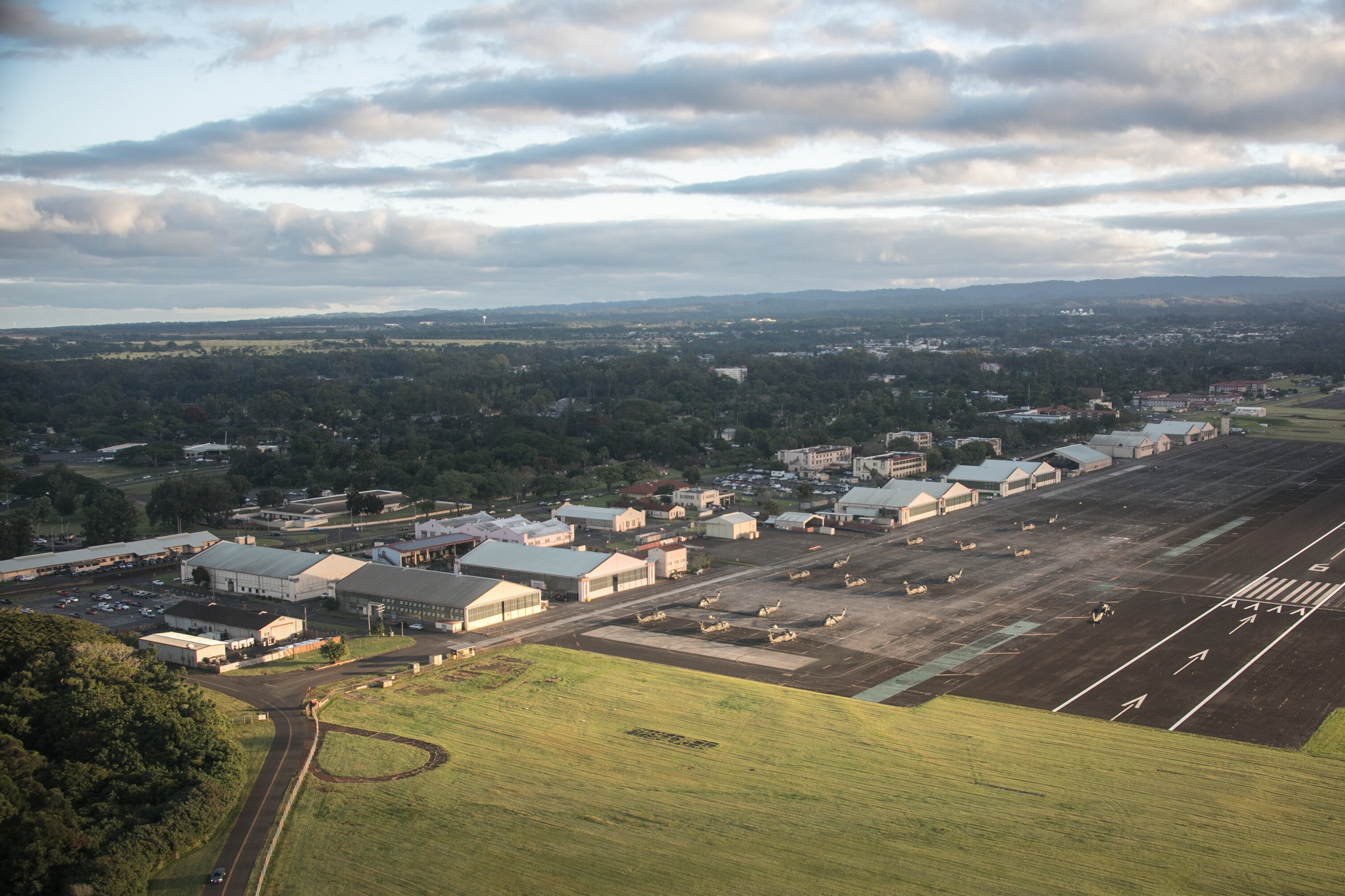 A U.S. Army UH-60 Black Hawk helicopter flies over the Division Run during Tropic Lightning Week on Wheeler Army Airfield, Hawaii, December 17, 2018.