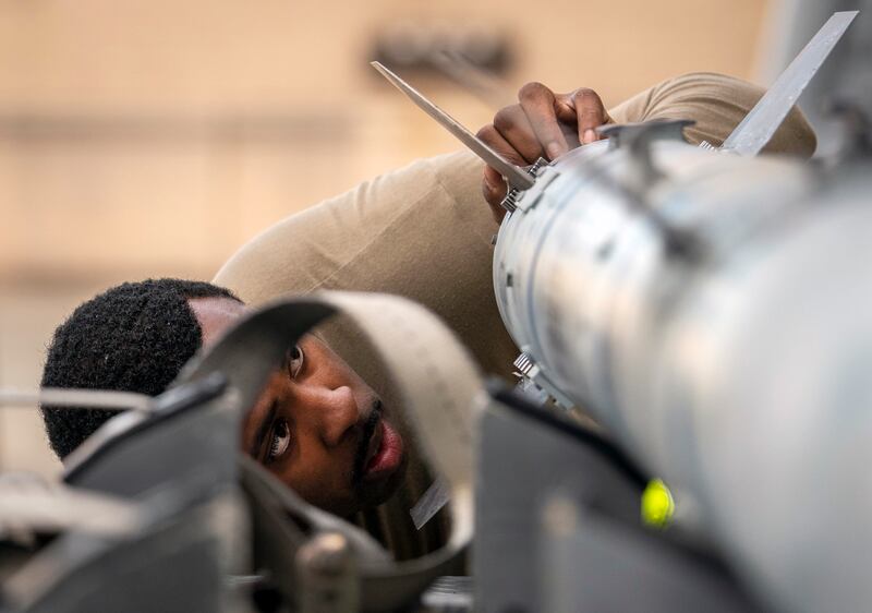 Staff Sgt. Donoven Wright, 43rd Fighter Generation Squadron, checks AIM-120 fins during the unit’s weapons load competition Feb. <a href=