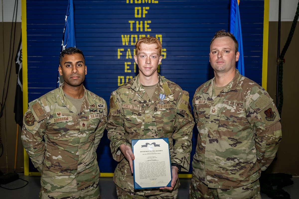Airman awarded medal for aid in capture of fugitive accused of murder Airman awarded medal for aid in capture of fugitive accused of murder