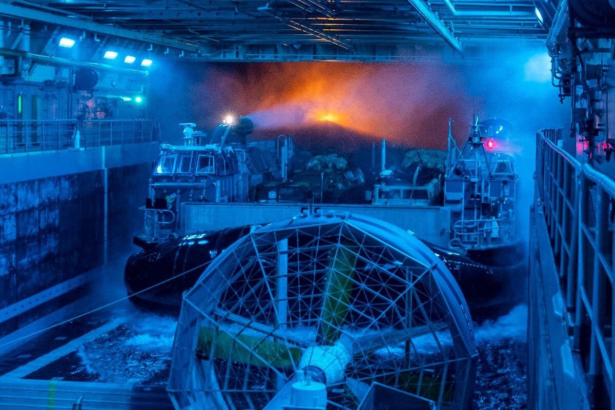 A landing craft, air cushion enters the well deck of the San Antonio-class amphibious transport dock ship USS John P. Murtha (LPD 26) on May 28, 2019, in the Pacific Ocean.