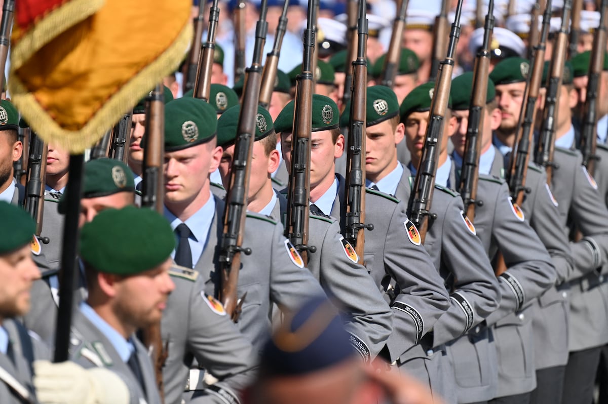 NextImg:Germany’s military build up continues, but personnel shortages remain