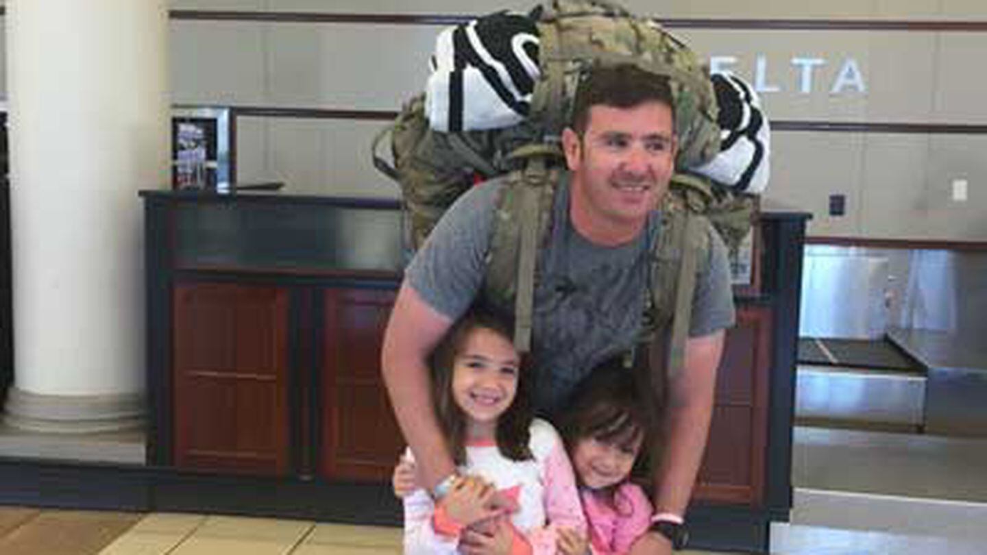 Dillon with daughters Katalina and Rorie, after Dillon returns from a deployment in September 2016. Photo courtesy of the author.