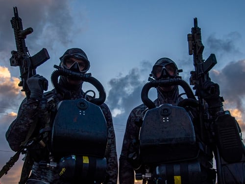 Sailors assigned to Naval Special Warfare Group 2 conduct May 29 dive operations on the East Coast of the United States. The Navy is seeking a permit to renew SEAL training at state parks in Washington. (Senior Chief Mass Communication Specialist Jayme Pastoric/Navy)