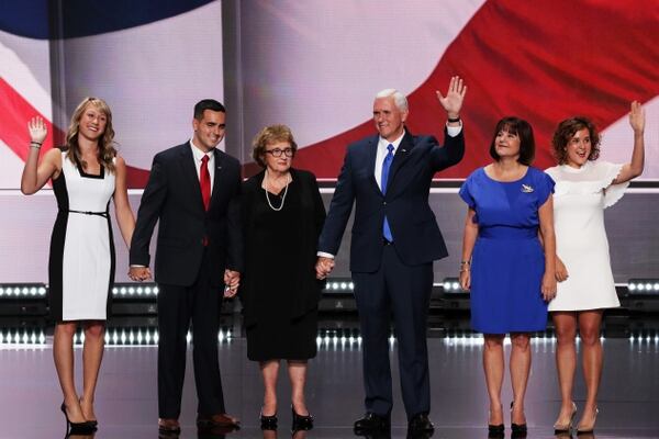 CLEVELAND, OH - JULY 20: Republican vice presidential candidate Mike Pence (C) acknowledges the crowd along with his son daughter Audrey Pence (L), Michael Pence (2nd-L), mother Nancy Pence (3rd-L), wife Karen Pence (2nd-R) and daughter Charlotte Pence (R) on the third day of the Republican National Convention on July 20, 2016 at the Quicken Loans Arena in Cleveland, Ohio. Republican presidential candidate Donald Trump received the number of votes needed to secure the party's nomination. An estimated 50,000 people are expected in Cleveland, including hundreds of protesters and members of the media. The four-day Republican National Convention kicked off on July 18. (Photo by Alex Wong/Getty Images)