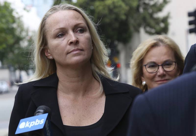 Margaret Hunter, left, wife of indicted Republican U.S. Rep. Duncan Hunter, arrives at federal courthouse in downtown San Diego on Thursday, June 13, 2019.