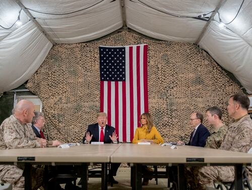 President Donald Trump, his wife, and senior advisers, speak to members of the media at Al Asad Air Base, Iraq, Wednesday, Dec. 26, 2018. (Andrew Harnik/AP)