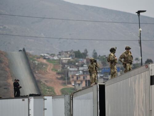 Mounted Border Patrol agents are seen as President Donald Trump inspects border wall prototypes in San Diego, Calif., on March 13, 2018. (Mandel Ngan/AFP via Getty Images)