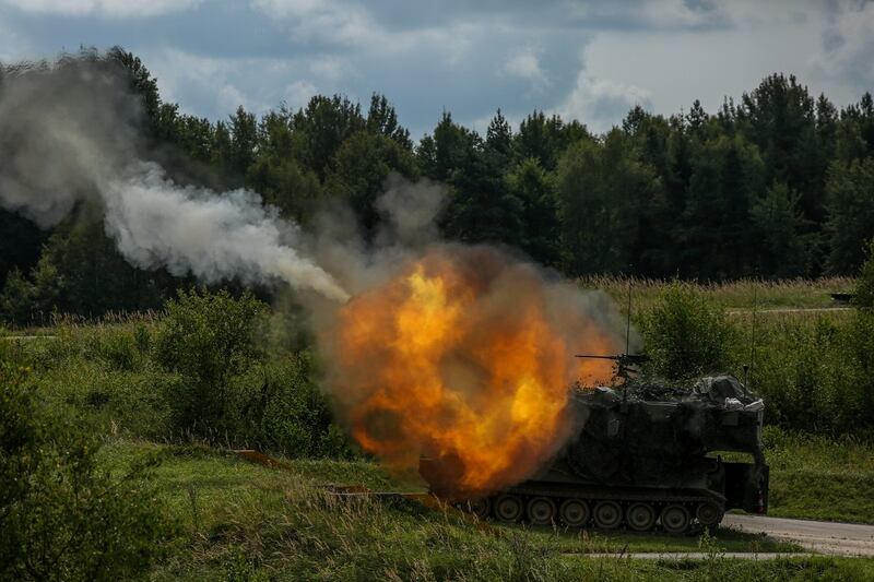 Soldiers from 3rd Armored Brigade Combat Team, 4th Infantry Division, fire a M109A6 Paladin howitzer while conducting live-fire training at the Grafenwoehr Training Area in Germany, Aug. 21, 2017. (Pfc. Zachery Perkins/Army)
