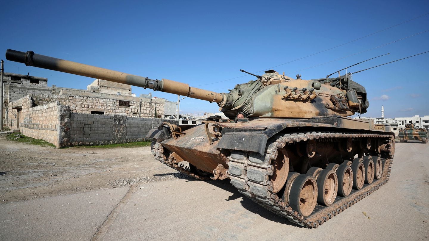 A Turkish M60 tank drives in the town of Sarmin, southeast of the city of Idlib in northwestern Syria, on Feb. 20, 2020. (Omar Haj Kadour/AFP via Getty Images)