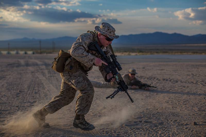 Lance Cpl. Seth Levine bounds forward during a simulated exercise of clearing a trench during Integrated Training Exercise 4-19 aboard the Marine Corps Air Ground Combat Center, Twentynine Palms, Calif.,