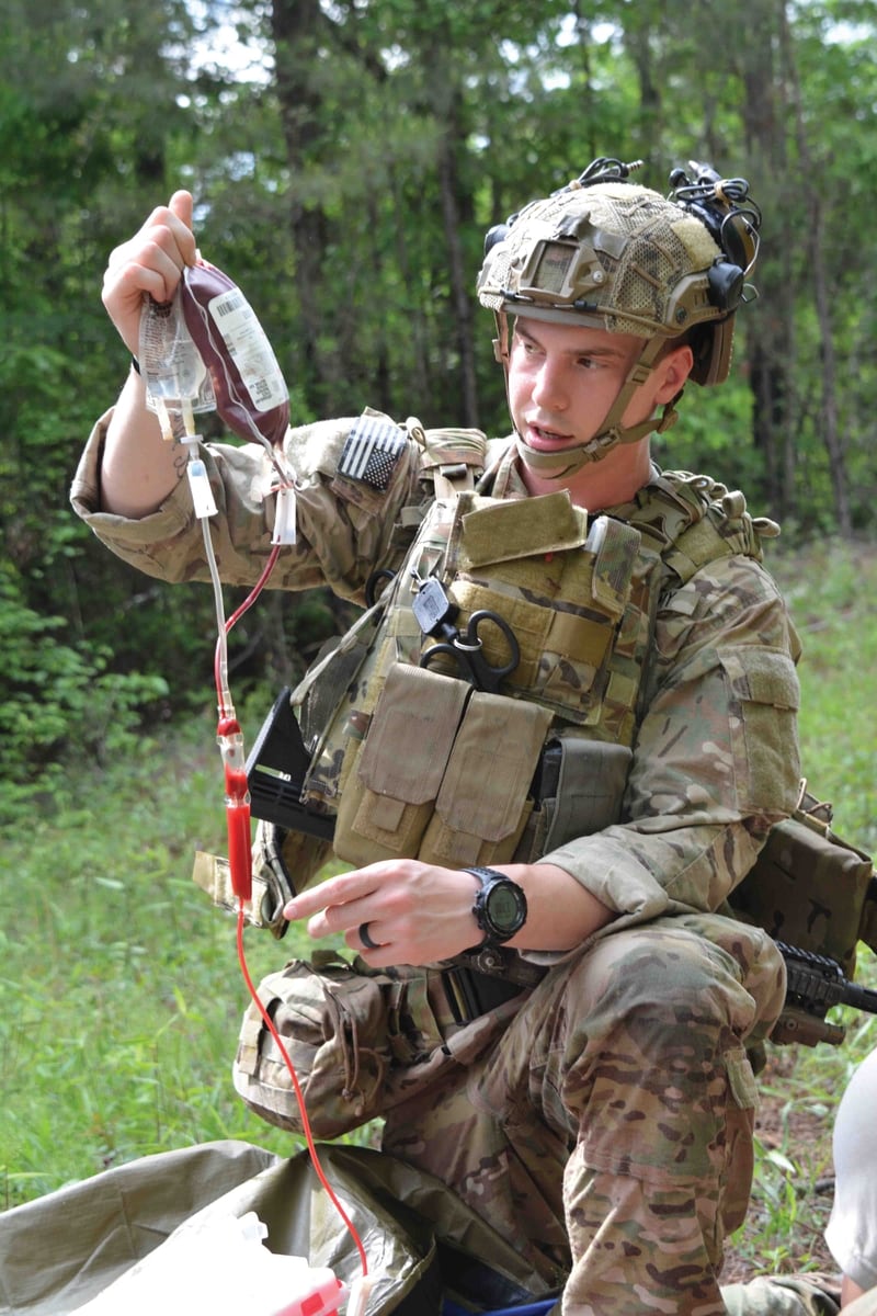 A medic from the 75th Ranger Regiment conducts combat trauma management training April 15 at Fort Benning. 
