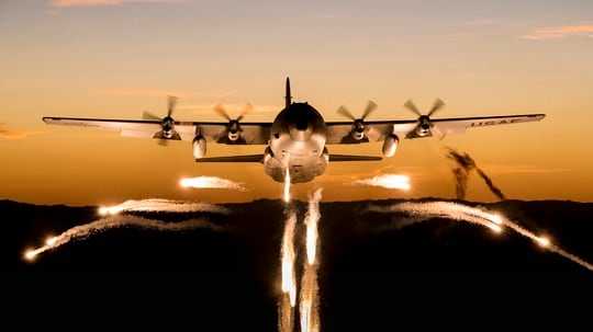 A C-130 Hercules from the Wyoming Air National Guard fires off flares over Camp Guernsey Joint Training Center, Wyo., during a training mission Sept. 24, 2019. (Staff Sgt. Jon Alderman/Air National Guard)