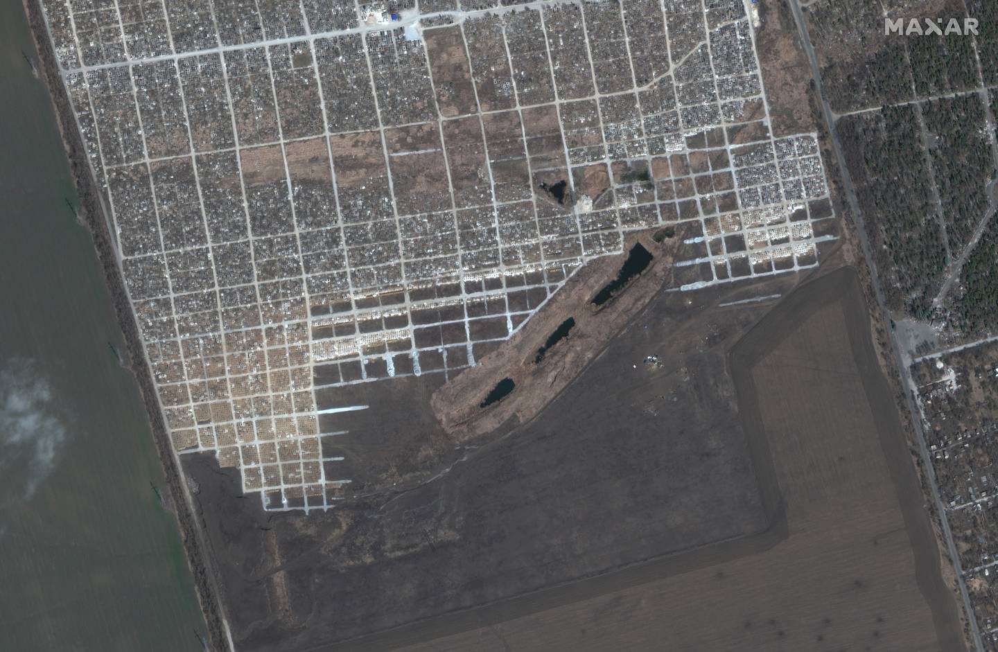 Satellite image shows a cemetery in Mariupol, Ukraine, March 29, 2022.