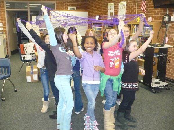 Young girls participate in an introductory exercise during a Girl Smarts workshop. (Provided by Dianna Flett)
