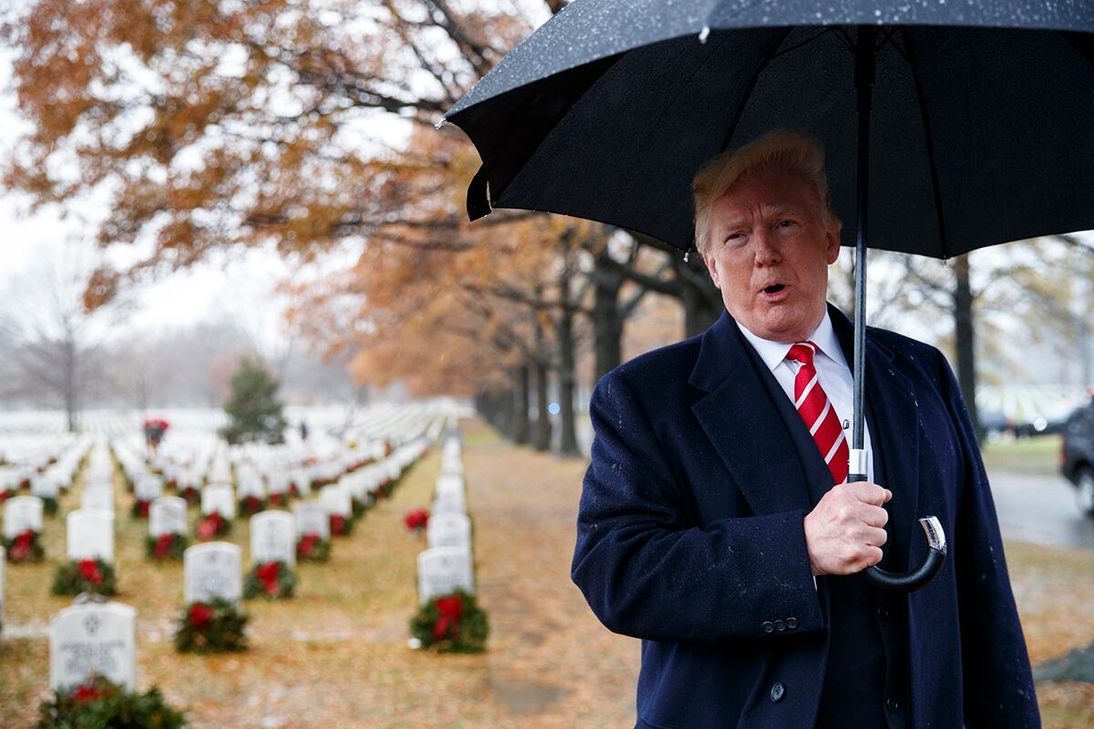 Trump Visits Arlington Cemetery For Holiday Commemoration