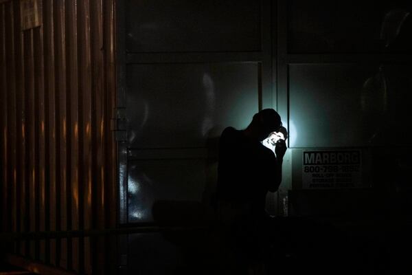Authorities lock away evidence taken from the scuba boat Conception in Santa Barbara Harbor at the end of their second day searching for the remaining divers on Tuesday in Santa Barbara, Calif. (Christian Monterrosa/AP)