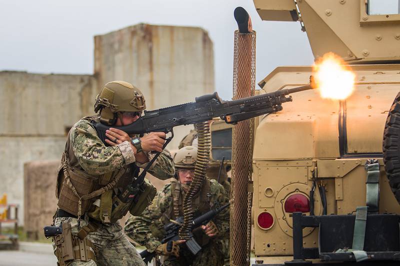 Engineman 2nd Class Christian McCain engages opposing forces while dismounted with an M240 machine gun on June 14, 2019, as the Coastal Riverine Squadron 1 convoy section is assessed at Naval Air Station Point Mugu, Calif.
