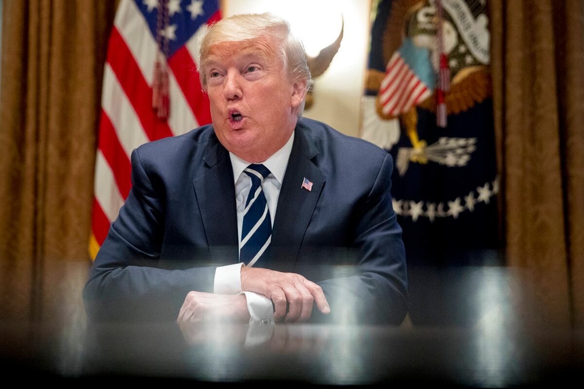 Trump Backs Down Under Fire Clarifies On Russia Meddling