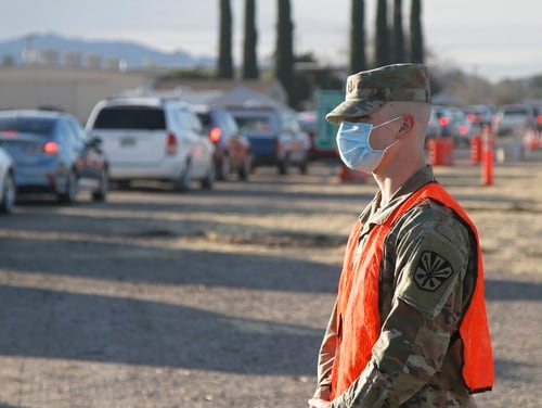 Arizona National Guard Medics help support Mohave County health department by checking in more that 600 patients and administering the COVID-19 vaccine at a vaccination site in Kingman, Ariz., on Feb. 10. (Spc. Thurman Snyder/Army National Guard)