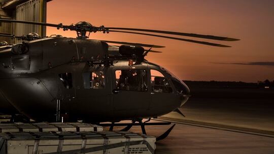 Nebraska Army National Guard Soldiers from 1-367th Aviation (Security & Support) Aviation Regiment, conduct daily maintenance checks on four UH-72 Lakota helicopters, the morning of Sept. 13, at the Florida National Guard Army Aviation Support Facility No. 1, in Jacksonville, Florida. (1st Lt. Edward Bosland/Nebraska National Guard)