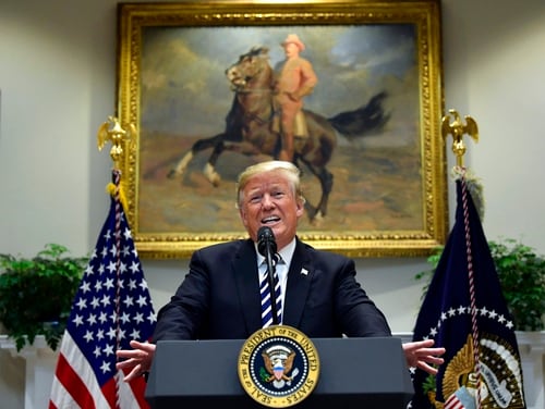 President Donald Trump talks about immigration and gives an update on border security from the Roosevelt Room of the White House in Washington on Thursday. Trump says asylum seekers must go to ports of entry in order to make a claim. He says he will issue an executive order next week on immigration. (Susan Walsh/AP)