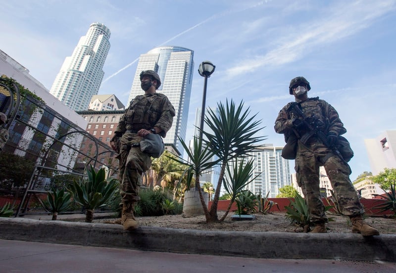 In this May 31, 2020, file photo members of the California National Guard patrol in Los Angeles. (Ringo H.W. Chiu/AP)