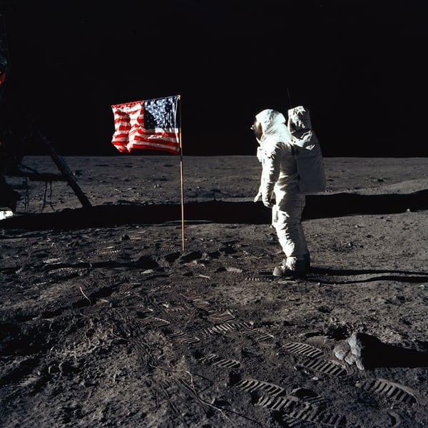 The iconic photo of astronaut Buzz Aldrin, pilot of the lunar module of Apollo 11, poses for a photo next to the US flag deployed. (NASA)