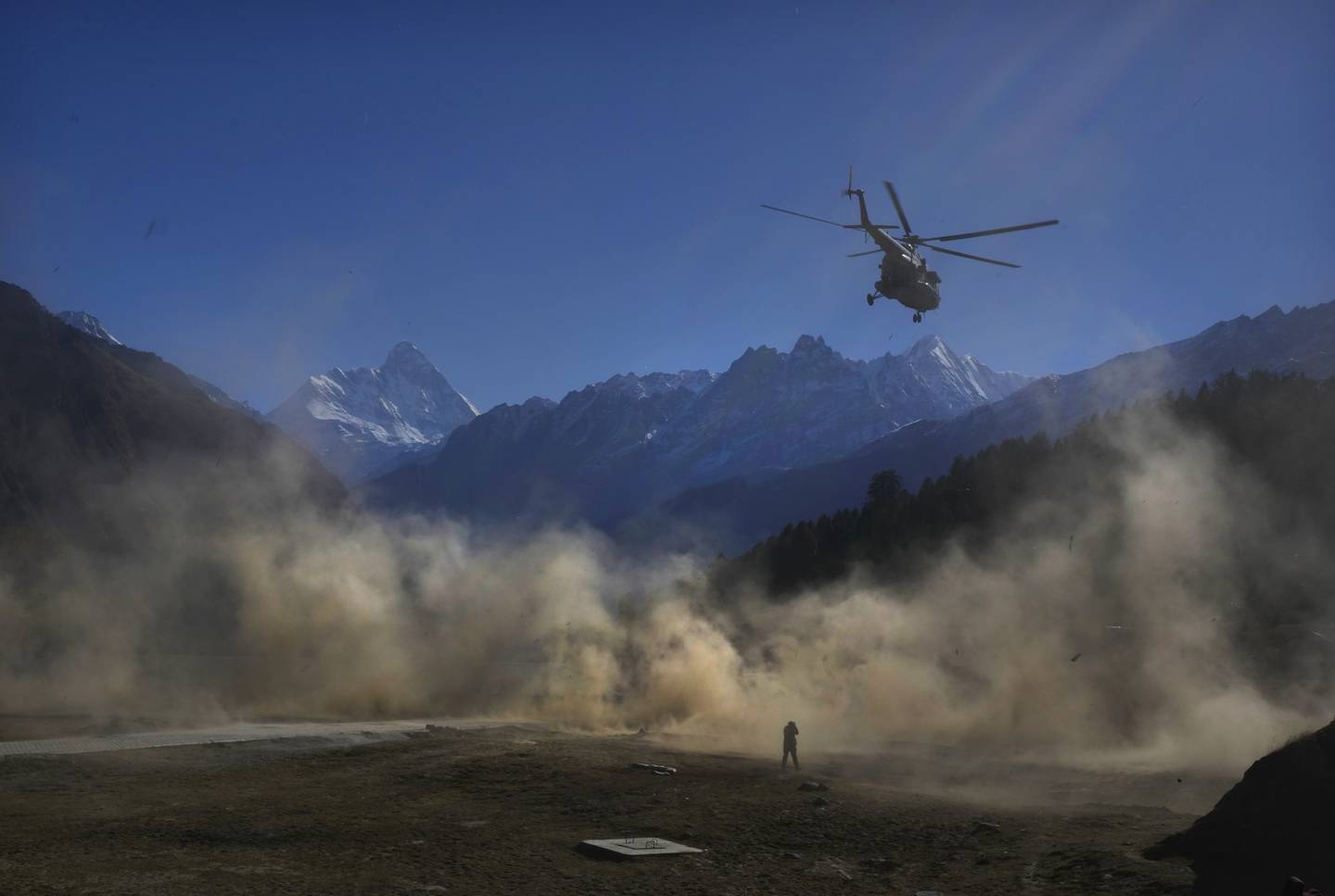 A helicopter carrying Indian army soldiers  takes off during Indo-US joint exercise or "Yudh Abhyas," in Auli, in the Indian state of Uttarakhand, Tuesday, Nov. 29, 2022.