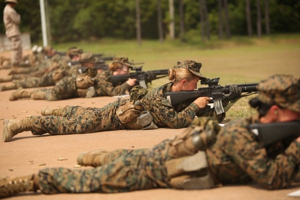 Recruits of November Company, 4th Recruit Training Battalion, fire during rifle marksmanship training May 28, 2014, on Parris Island, S.C. The recruits fired more than 200 rounds each over five days. At the end of the week, they attempted to qualify by shooting from distances of 200, 300 and 500 yards. November Company is scheduled to graduate July 3, 2014. (Parris Island has been the site of Marine Corps recruit training since Nov. 1, 1915. Today, approximately 20,000 recruits come to Parris Island annually for the chance to become United States Marines by enduring 13 weeks of rigorous, transformative training. Parris Island is home to entry-level enlisted training for 50 percent of males and 100 percent of females in the Marine Corps.Photo by Cpl. Octavia Davis)