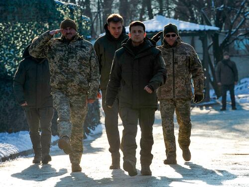 Ukrainian President Volodymyr Zelenskiy, second from right, meets with servicemen while visiting the Donetsk region of Ukraine on Dec. 6, 2019. (Evgenya Maksymova/AFP via Getty Images)